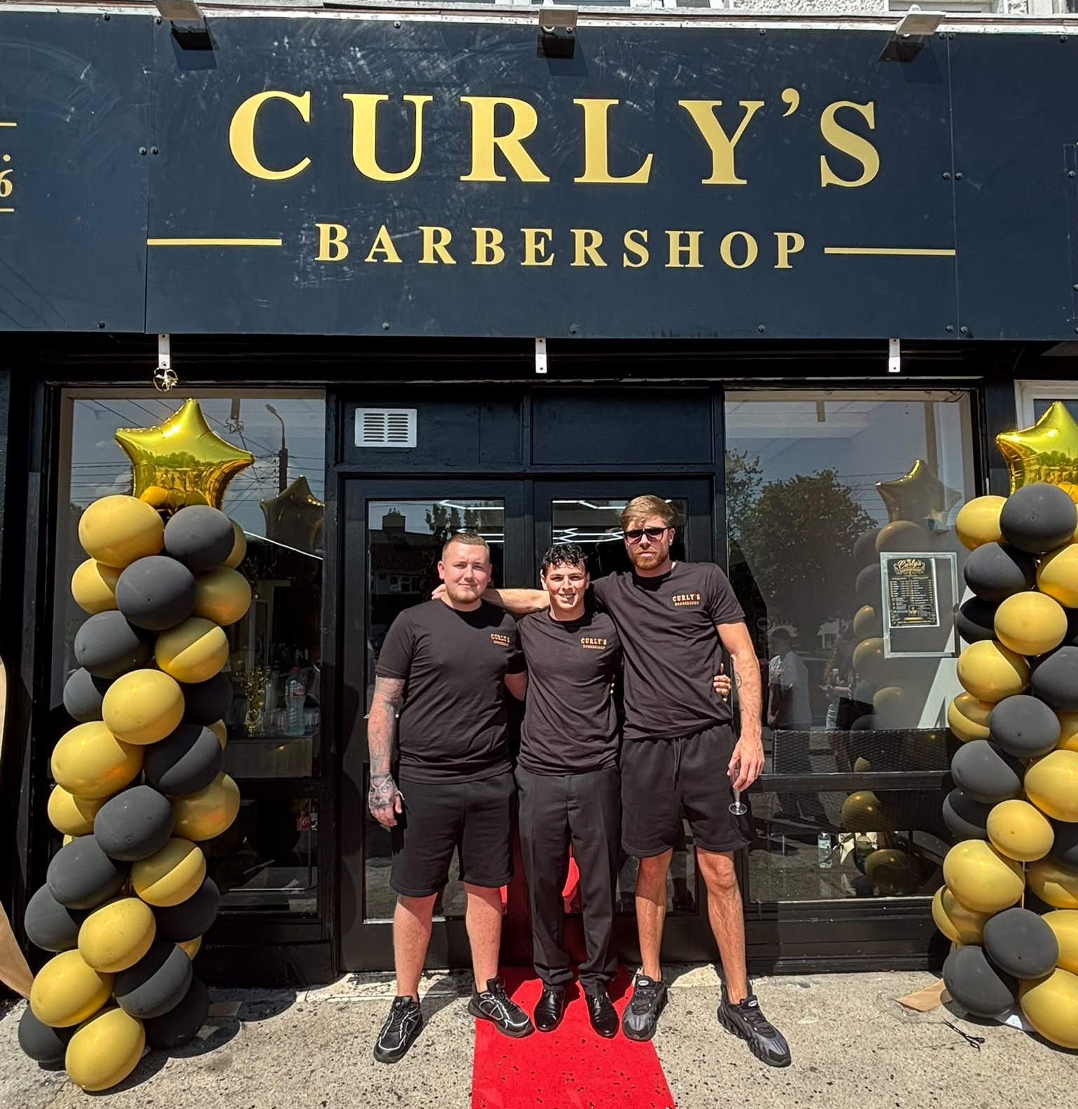The Curly's Barbershop team outside the shop on Shanard Road, Santry, Dublin 9